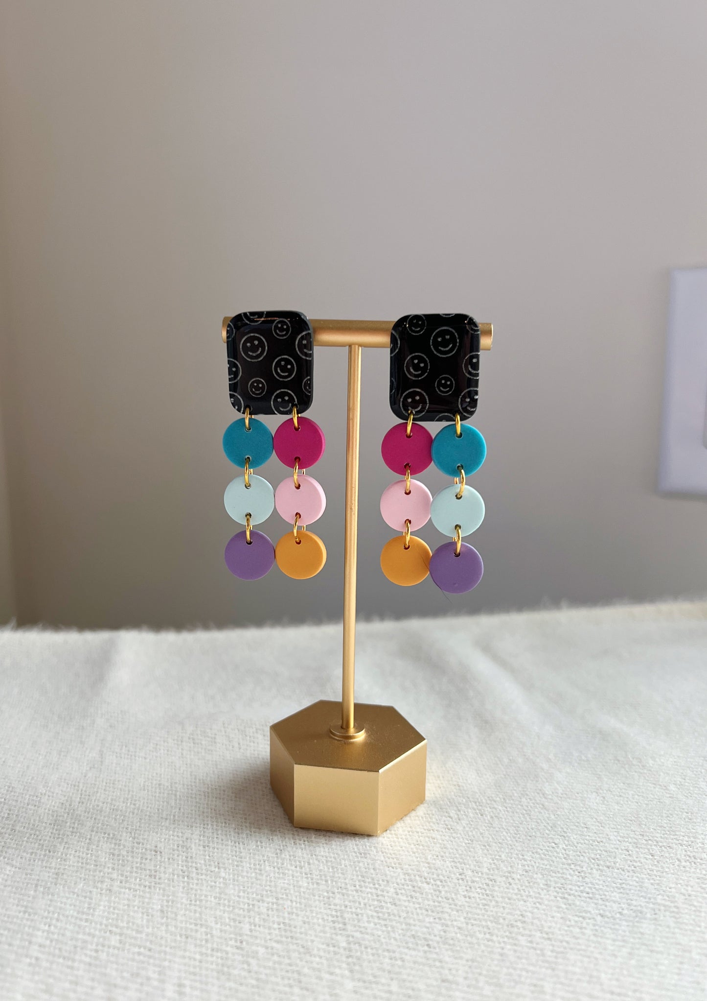 Smiley Print Squares with rainbow dangles