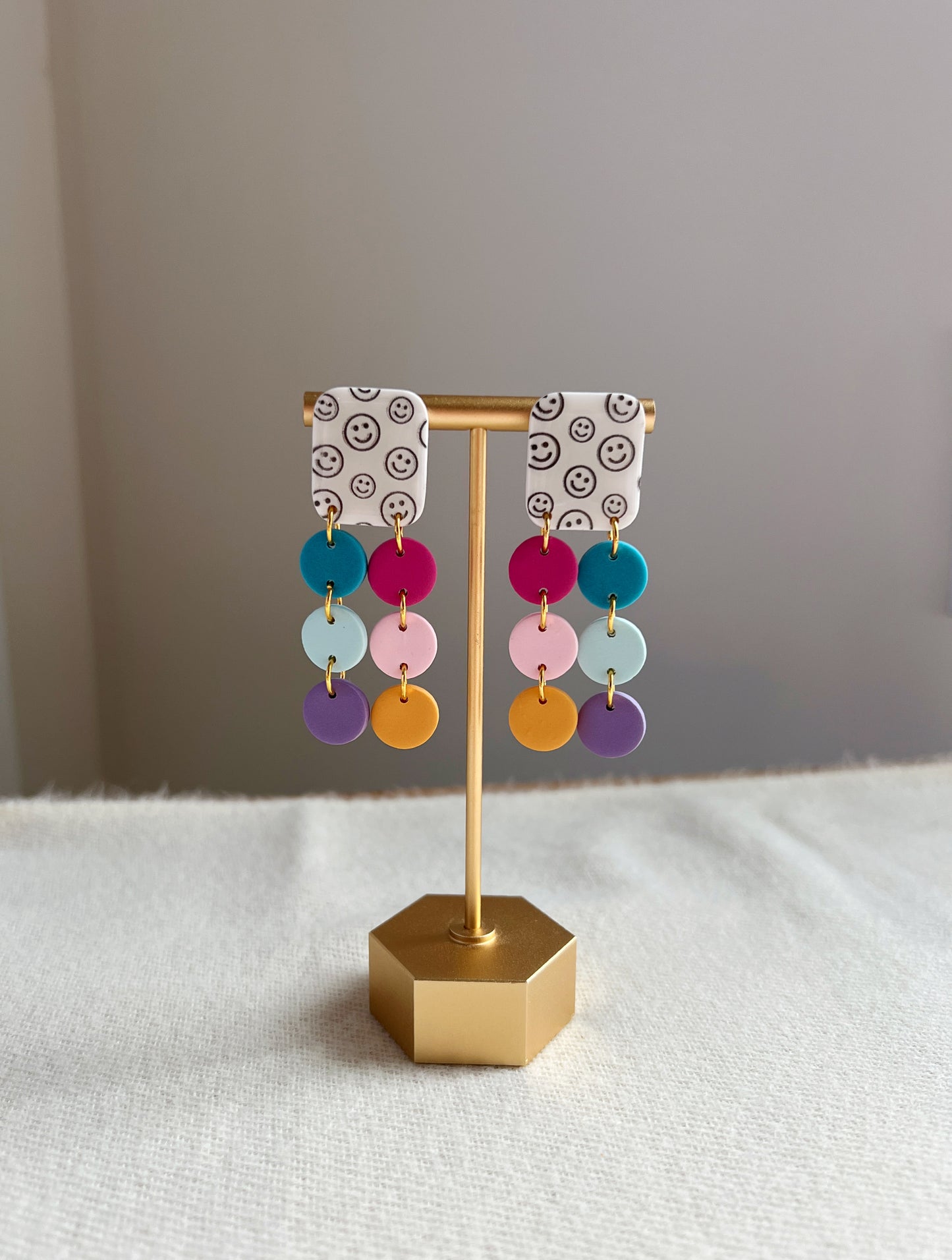 Smiley Print Squares with rainbow dangles